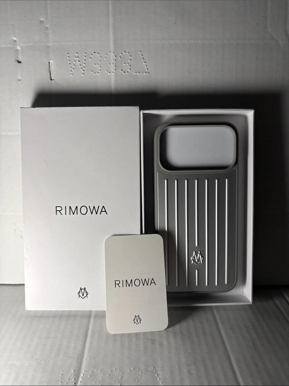 RIMOWA Silver Ribbed iPhone Case with Branded Card